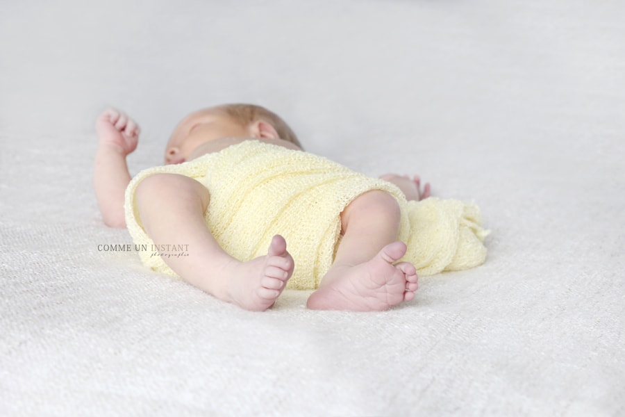 photographe pro pour nouveau ne en plein coeur de Montmorency (95160 Val d'Oise 95) - bébé - nouveau né studio - bébé studio - photographe nouveau né - bébé aux yeux bleus